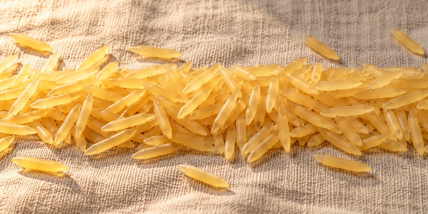Golden parboiled sella basmati grains
